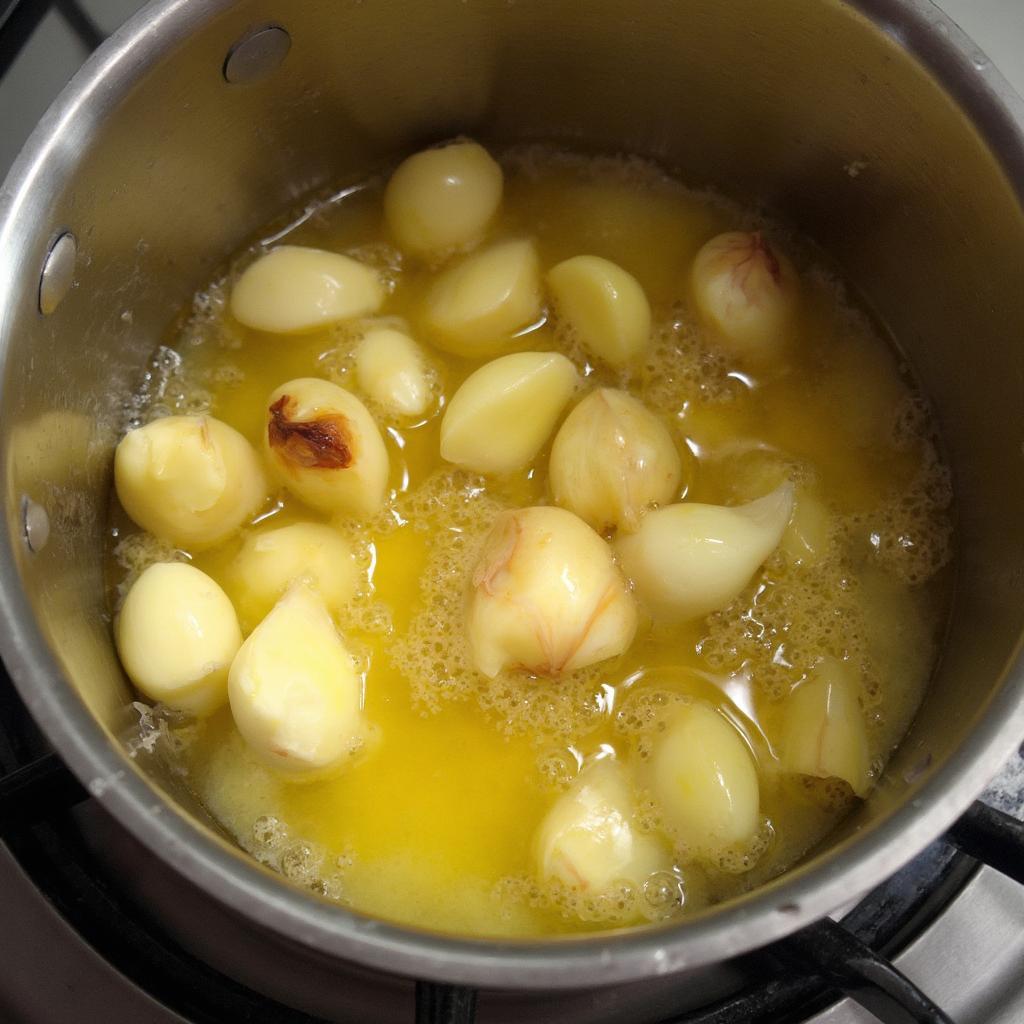 Melting butter and garlic in a pot