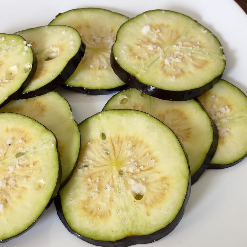 Salting Eggplant Slices for Italian Recipes